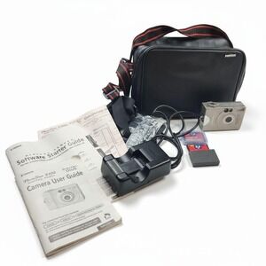 Vintage Canon PowerShot S100 Digital ELPH Silver Camera Kit 2.1MP Tested